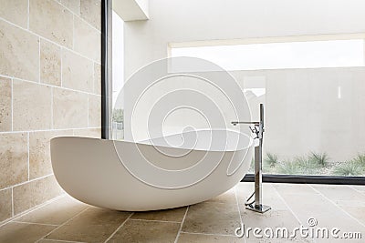 Modern white bathtub Stock Photo