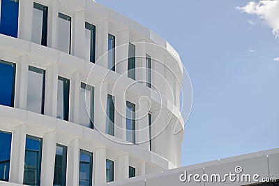 modern white building exterior symetric windows in a row modern architecture Stock Photo