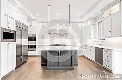 Modern white and grey kitchen with stainless steel appliances. Editorial Stock Photo