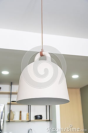 modern white lamp hanging kitchen ceiling, home decor, low angle Stock Photo