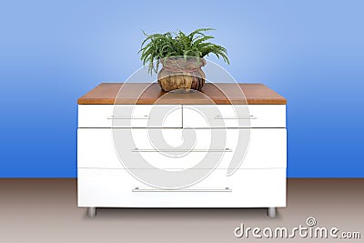 Modern white wooden chest of drawers Stock Photo