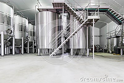 Modern wine cellar with stainless steel tanks Stock Photo