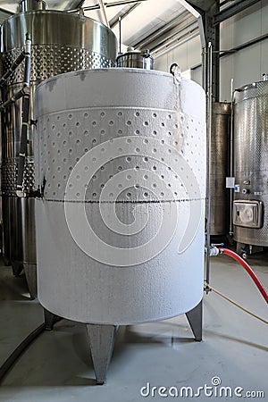 Modern wine fermenter tank iced Stock Photo