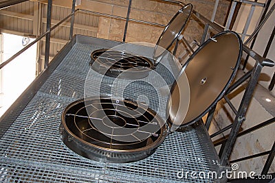 Modern winemaking vats for fermenting grapes and producing wine at the winery Stock Photo