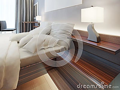 Modern wooden bedside nightstand in the form of shelves. Stock Photo