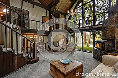 Modern wooden cottage house interior with living room close up Stock Photo