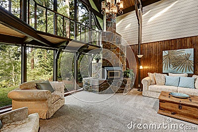 Modern wooden cottage house interior with living room close up Stock Photo