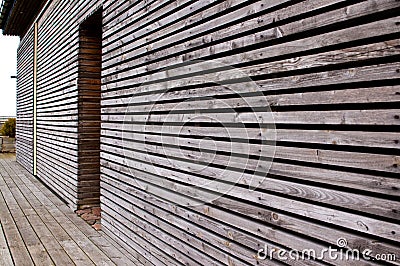 Modern wooden house facade made of horizontal planks Stock Photo