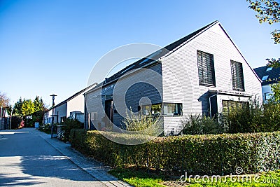 Modern wooden house in housing estate, Germany Stock Photo