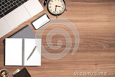 Modern work place wooden desk in office , Top view flat lay of stationary laptop computer and notebook memo with copy space Editorial Stock Photo