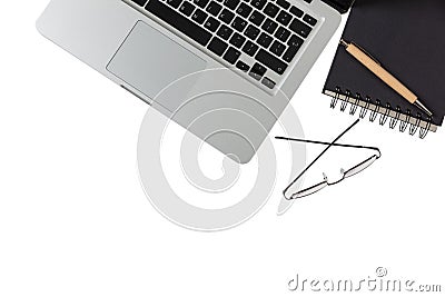Modern workspace, laptop and black notepad on white background, copy space, top view Stock Photo