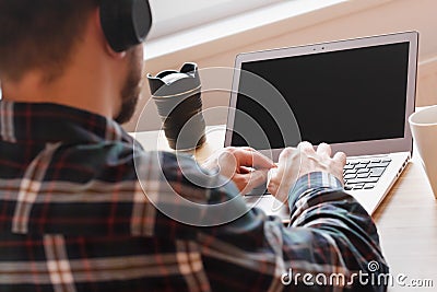 Modern workspace of professional artist or photographer, working on laptop computer, tablet , music creator, home interior. Stock Photo