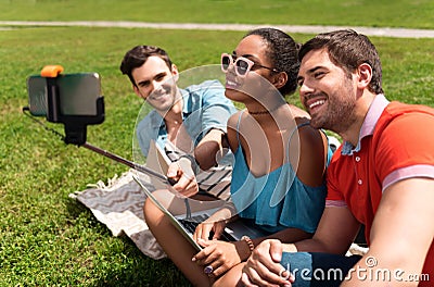 Modern youth relaxing outdoors Stock Photo