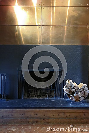 Modernistic fireplace with firewood Stock Photo