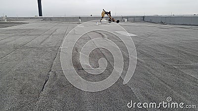 Roof Leak repairs, modified roof on commercial building found air pockets Stock Photo