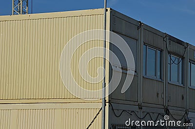 modular housing in stacked container cells. each module has a Stock Photo