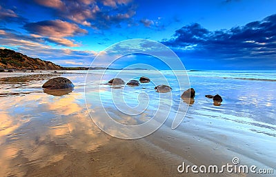 Moeraki Boulders Cloud Reflection Stock Photo