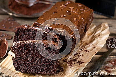 Moist chocolate cake with milk chocolate topping glaze Stock Photo