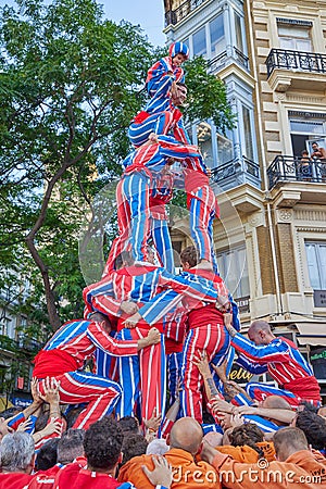 Moixiganga group forming human tower on the street festival in Valencia Editorial Stock Photo