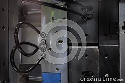 Mold plates - part of automatic injection molding machine at exhibition Stock Photo