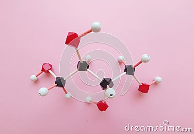 Molecular structure model of erythritol molecule. Erythritol is an artificial sweetener used to replace sugar. Stock Photo