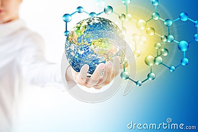 Molecules and globus in hand, Molecular medical, ecology abstraction in hand. Virus and planet Earth. Molecule and atoms Stock Photo