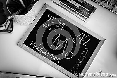 Molybdenum and symbol structural formula chemical on the blackboard Stock Photo