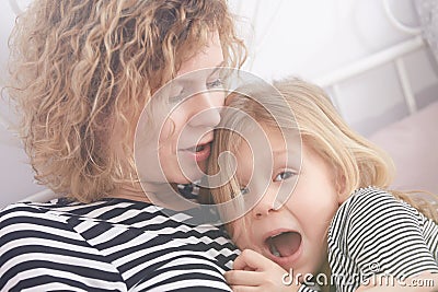 Mom calming daughter Stock Photo