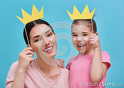 Mom and child are holding crown Stock Photo