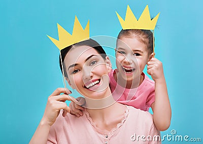 Mom and child are holding crown Stock Photo