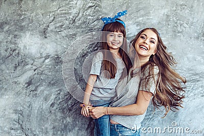 Mom with daughter in family look Stock Photo