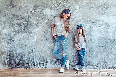 Mom with daughter in family look Stock Photo