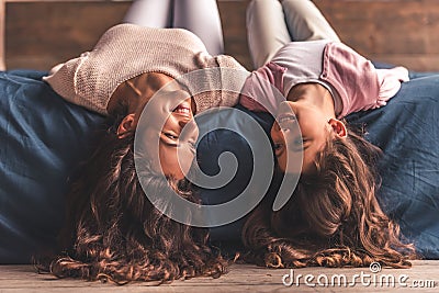 Mom and daughter at home Stock Photo