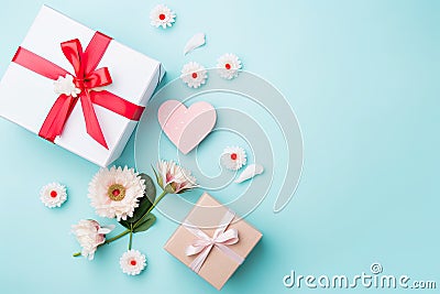 Mom Deserves the Best: Show your appreciation for mom with this beautiful flat lay photo of gift boxes, flowers Stock Photo