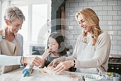 Mom, grandmother and kid baking with flour dough at kitchen counter, family home and house for love, teaching and Stock Photo