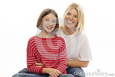 Mom with her teenage daughter hugging and laughing Stock Photo