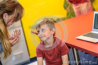 Mom instructs her son Stock Photo