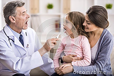 Mom with kid at the doctor. Stock Photo