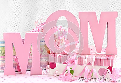 MOM letters and pretty wrapped gifts Stock Photo