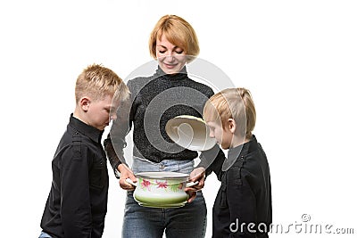 Mom made soup, the kids opened the pot and didn't like the food Stock Photo