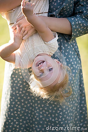 Mom playing with tot daughter Stock Photo