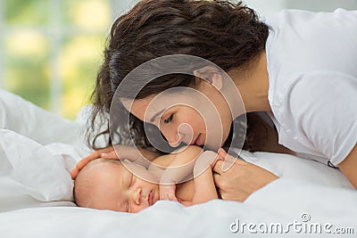 Mom`s love newborn. Stock Photo