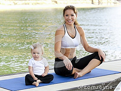 Mommy daughter yoga Stock Photo