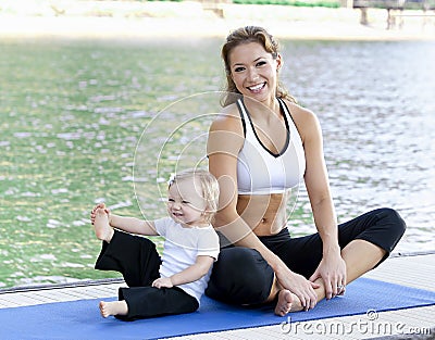 Mommy daughter yoga Stock Photo