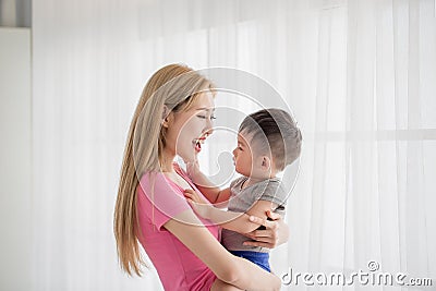 Mommy hug her son Stock Photo