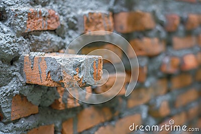 Mon brick on the wall Stock Photo