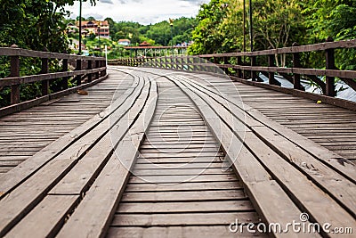 Mon Bridge Wooden bridge over the river in Sangkhlaburi District, Kanchanaburi. Stock Photo