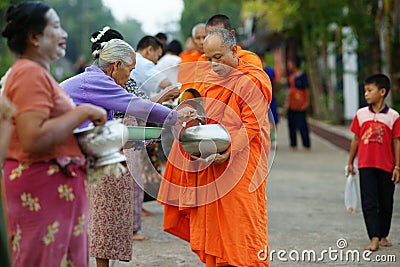 Mon buddhist monks collecting alms Editorial Stock Photo