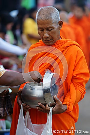 Mon buddhist monks collecting alms Editorial Stock Photo