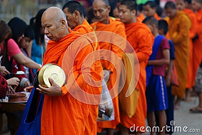 Mon buddhist monks collecting alms Editorial Stock Photo